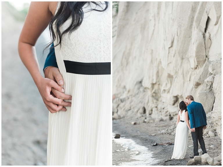 Couple walks together on beach during their engagement session