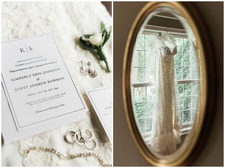 Wedding invitations on the dress, and dress hanging in the window