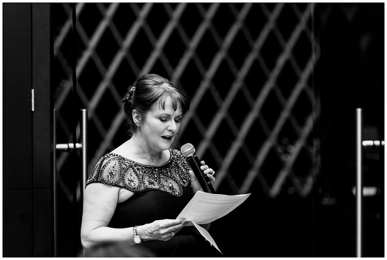 Mother of the Bride reciting speech at jump restaurant wedding