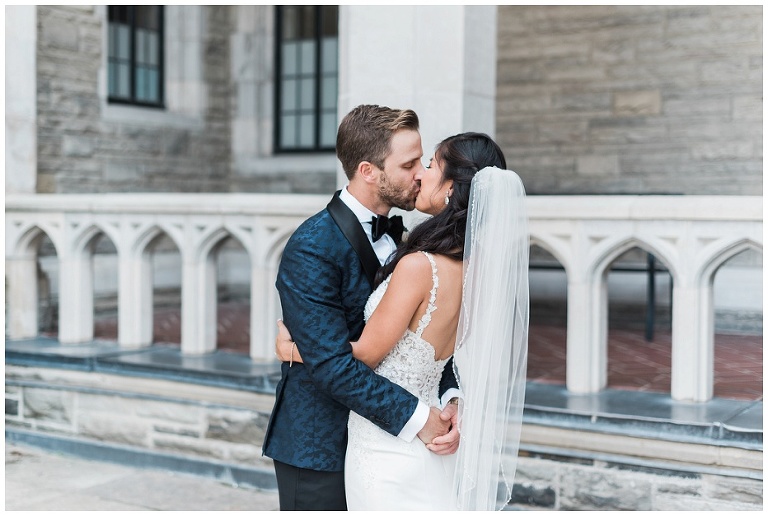 Groom kisses bride for the first time on their wedding day at Casa Loma