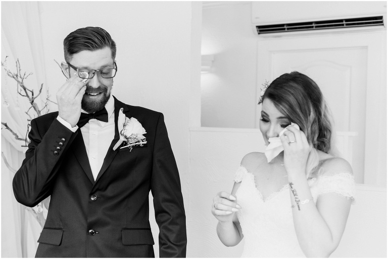 Bride and groom crying with tissues inside Toronto Wedding Chapel after their elopement taken by top 10 toronto wedding photographer