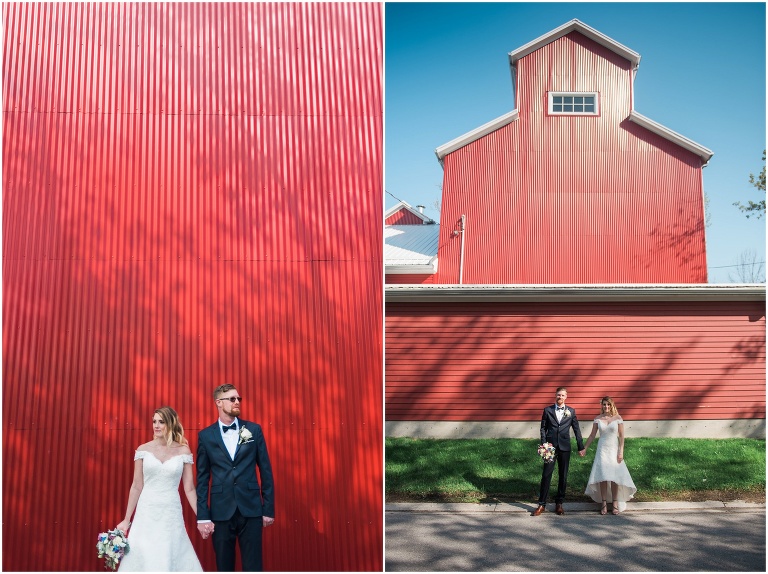 Bride and groom standing together against red wall in Unionville for their wedding photos
