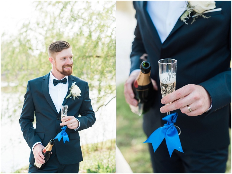 Portrait of groom as she hold champagne after eloping in Unionville at Too Good Pond