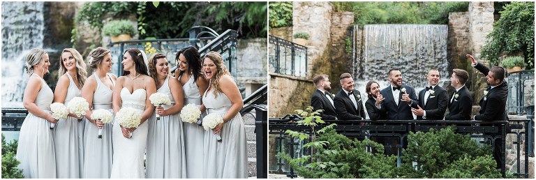 Bride and groom post with their wedding party in front of the waterfall at The Ancaster Mill in Hamilton Ontario