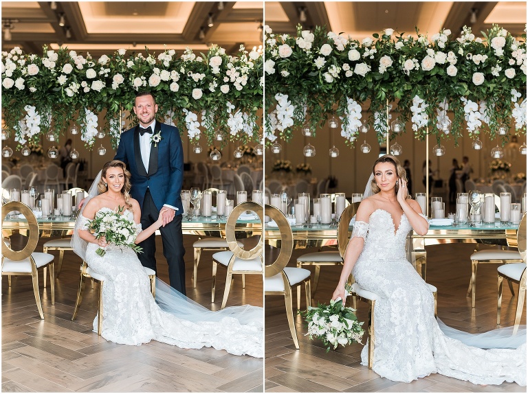 Bride and groom pose together inside of their Arlington Estate wedding surrounded by stunning florals and orchids