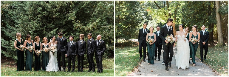 Wedding party together against greenery and walking at Victoria Park on Elora Mill Wedding day