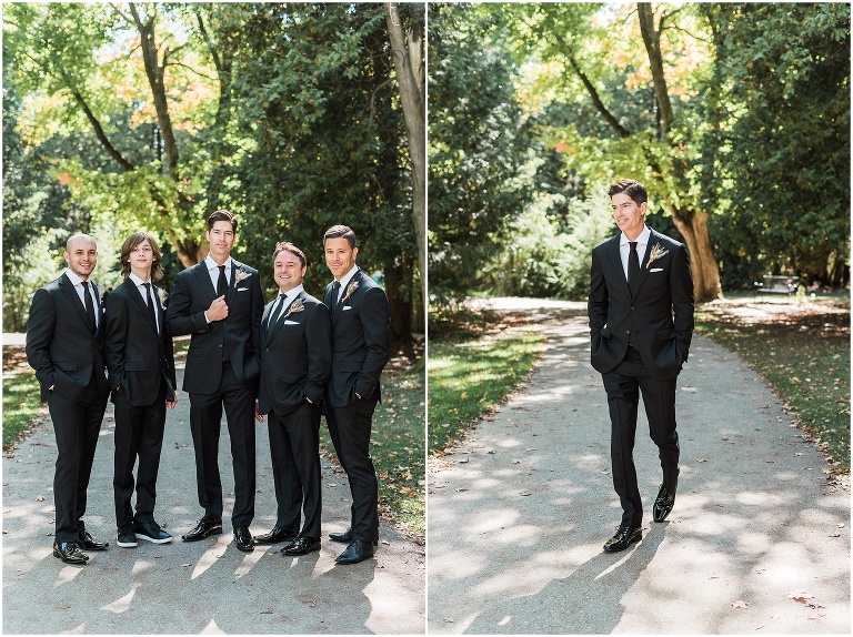 Groom and groomsmen walking together laughing at Victoria Park in Elora