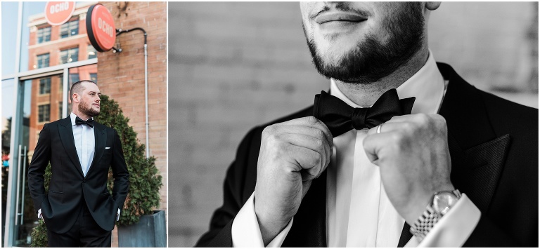 Groom stands outside of Hotel Ocho in portrait