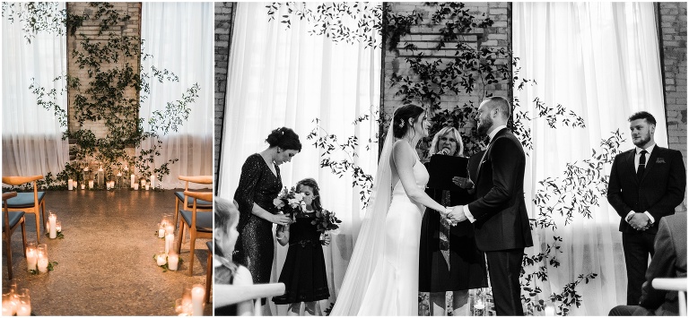 Candle lit ceremony aisle and bride and groom standing at the front getting married at Hotel Ocho