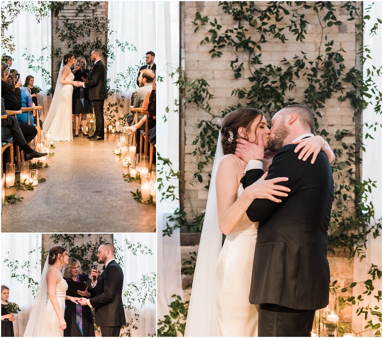 Candle lit ceremony space as bride and groom have their first kiss