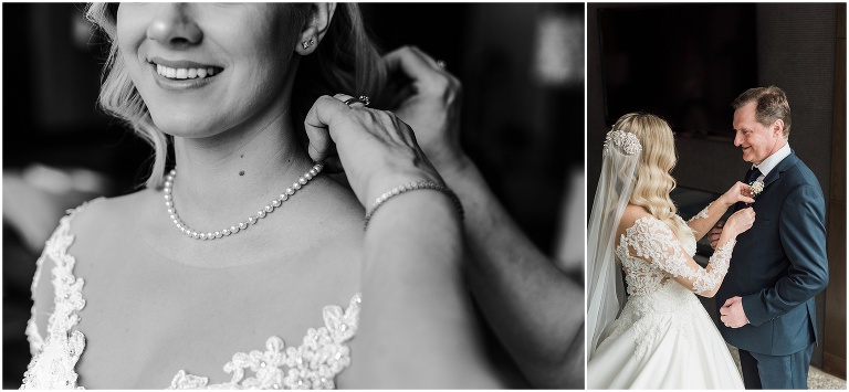 Black and white photo of bride's mom's hands doing her up daughter's pearl necklace