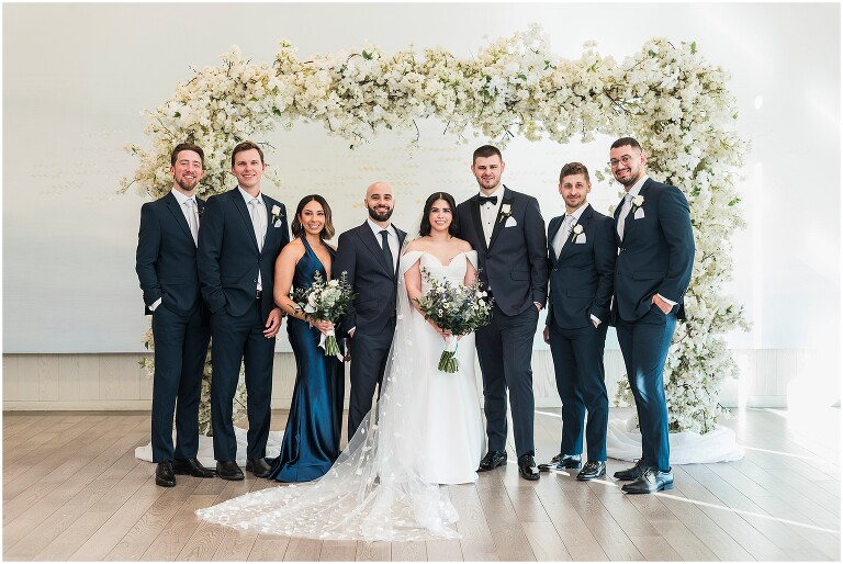 Wedding party photo inside the Pearle Hotel in the Northshore Room