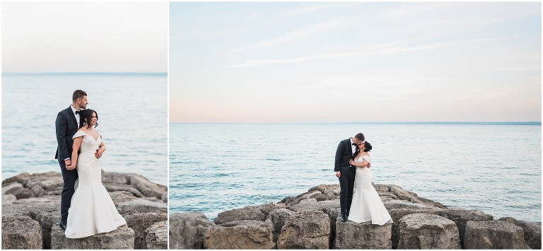 Bride and groom embracing each other during sunset at Burlington waterfront