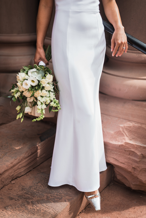 Bride's dress and shoes on Old City Hall steps